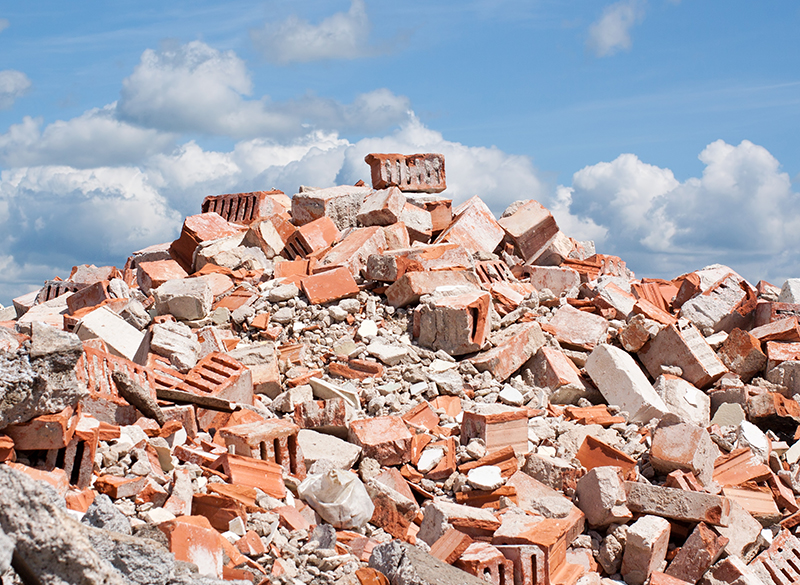 Concrete and brick rubble derbis on construction site